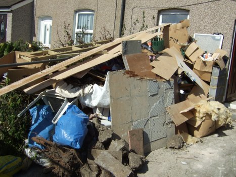 Professional rubbish removal team at work